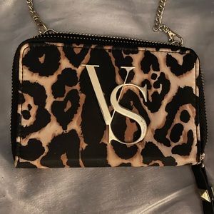 Small Victoria’s Secret wallet on removable chain.  Excellent condition!